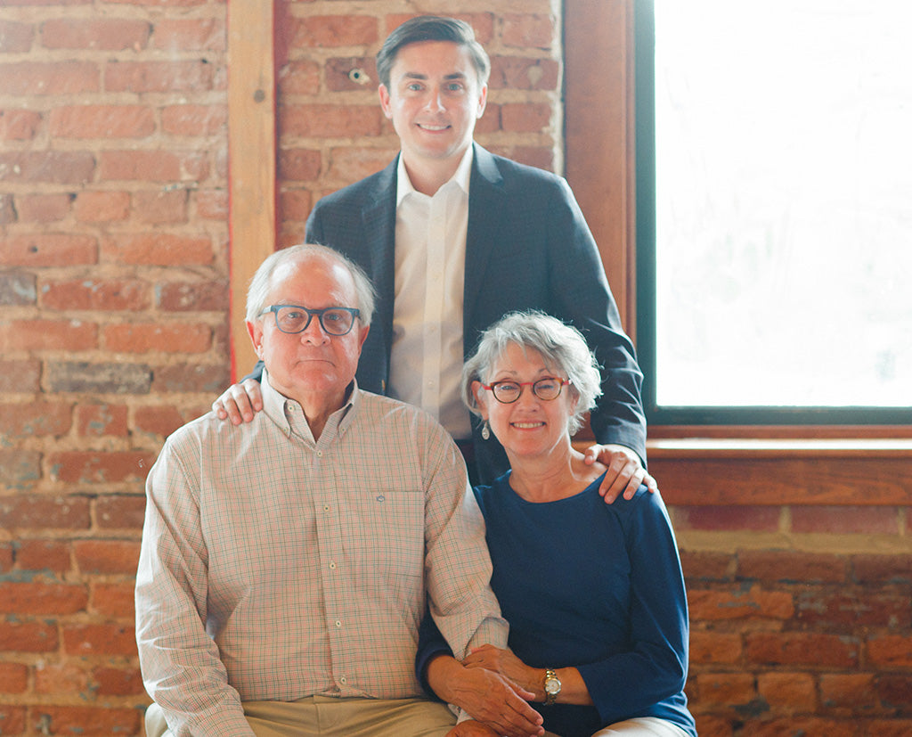 Boardroom Socks family together smiling