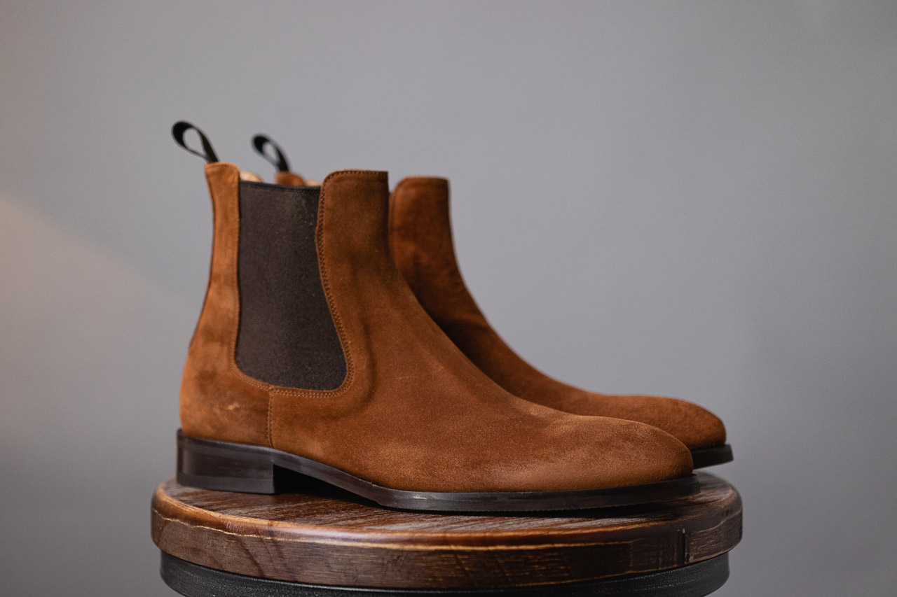 side view of brown chelsea boots in water repellent suede