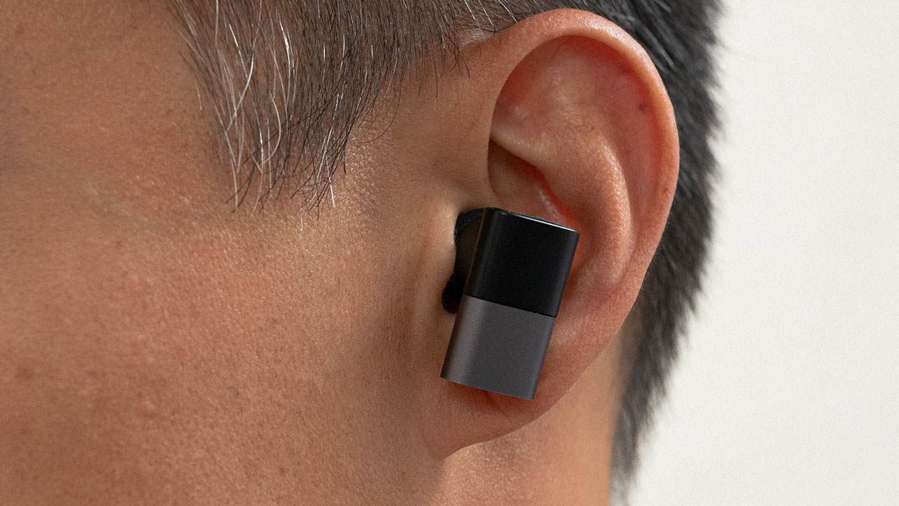 status audio between pro earbuds in ear