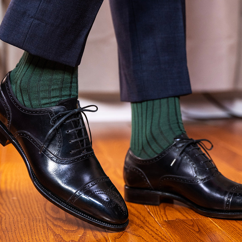 forest green dress socks and black oxfords with navy slacks